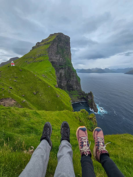 istock Exploring the breathtaking cliffs of the Faroe Islands on a cloudy day 2228061377