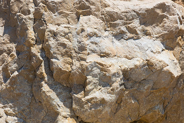 istock Stone texture background. Natural surface of the rock. Close-up. 2228062854
