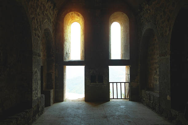 istock Dark view. Window in the church 2228070671