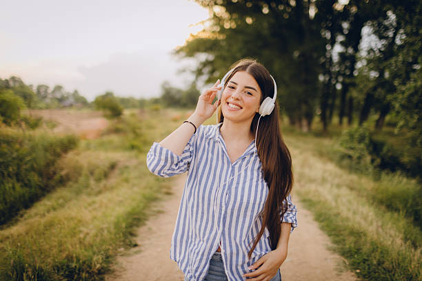 istock Young woman relaxing in nature 2228071016