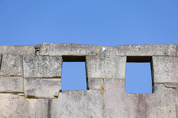 istock Machu Picchu in Peru showing Stone wall at archaeological site at daylight 2228082063