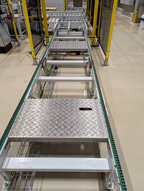 istock Industrial Conveyor Belt System and Safety Measures in a Factory Setting 2228092214