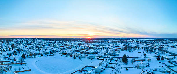 istock Aerial Winter Sunset Over Snowy Suburban Grid, Panorama 2228095072