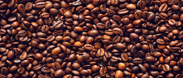 istock Roasted coffee beans texture background as  texture background for web page, template banner 2228095345
