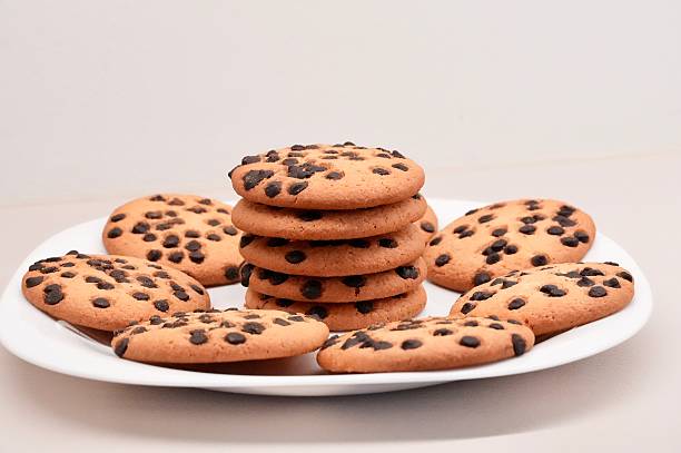 istock Chocolate chip cookies on a white plate on a white background. 2228096711