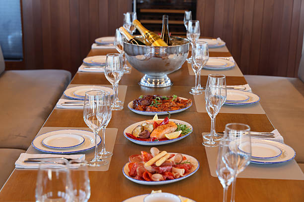 istock An Exquisite and Elegant Dining Setup Featuring Fine Champagne and Gourmet Culinary Delights 2228100693