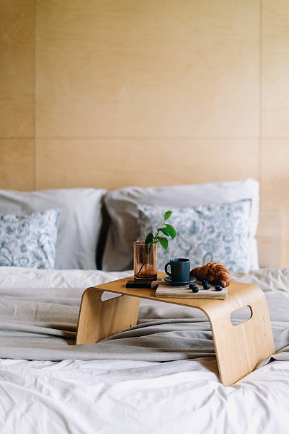istock Cozy hotel bedroom featuring a comfortable bed and minimalist decor 2228106980