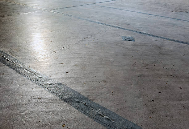 istock Close-up and wide view of an empty concrete surface with visible lines and structure, ideal for industrial or architectural backgrounds 2228112992