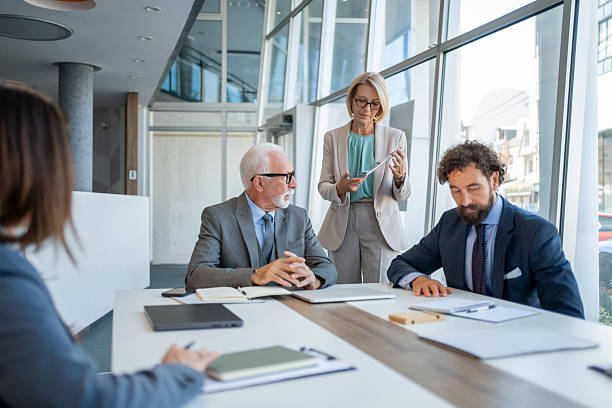 istock Business team discussing during a meeting in a modern office 2228113006