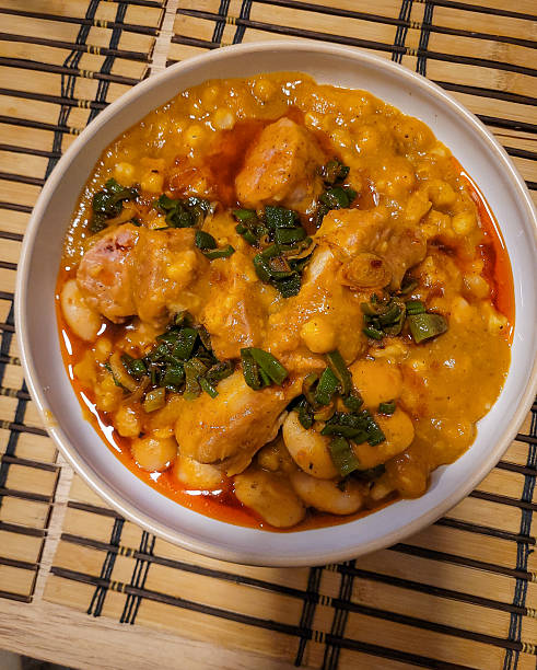 istock Traditional Stew with Corn, White Beans and Pork in a Rich Sauce 2228116929
