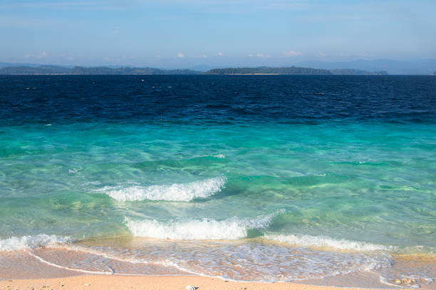 Beautiful sandy beach and sea water and waves in southern Thailand, Asia