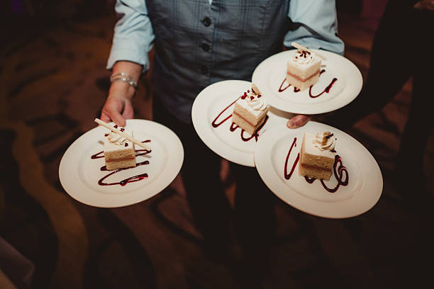 istock Wedding reception dessert of cake slices with raspberry jam filling 2228131050