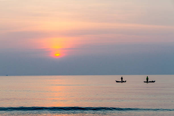 Sunrise on sea in morning and silhouette at Ban Krut Beach, in Prachuap Khiri Khan Province Thailand is famous for travel.