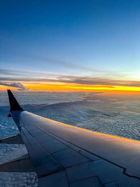 istock Stunning Sunset View from Airplane Wing 2228138786