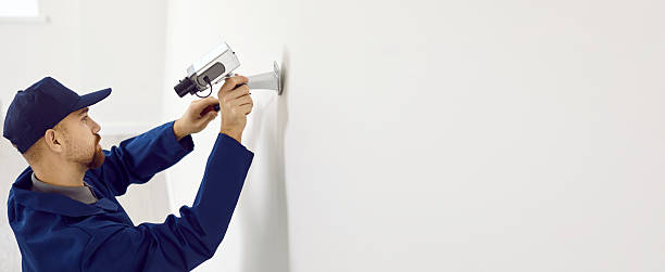 istock Banner of technician install camera on wall 2228143009