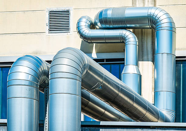 istock Large metal ductwork installation in a commercial facility highlighting ventilation systems and air circulation technology 2228148411