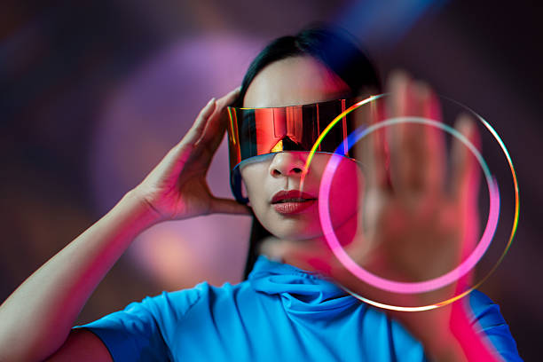 istock Futuristic Woman Wearing Reflective Visor Glasses 2228149330