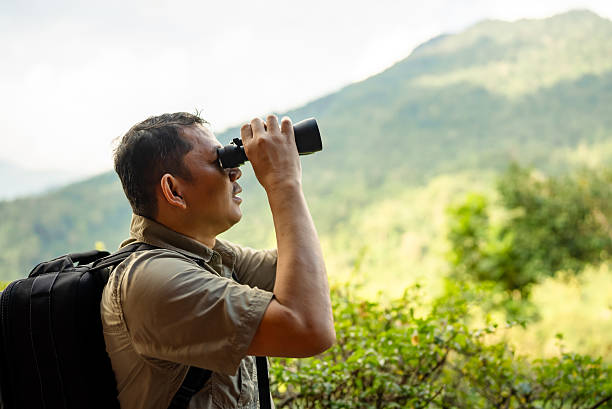 istock Male nature lover out birding in a pristine fores 2228154060