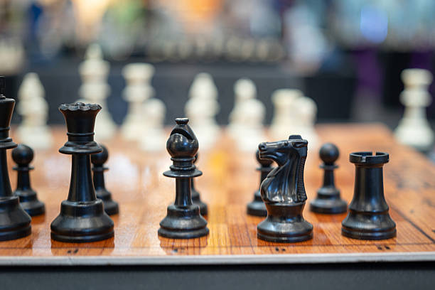 Set of chesspiece that prepare on the chessboard, preparing for the challenge battle. Recreation activity, close-up at the object.