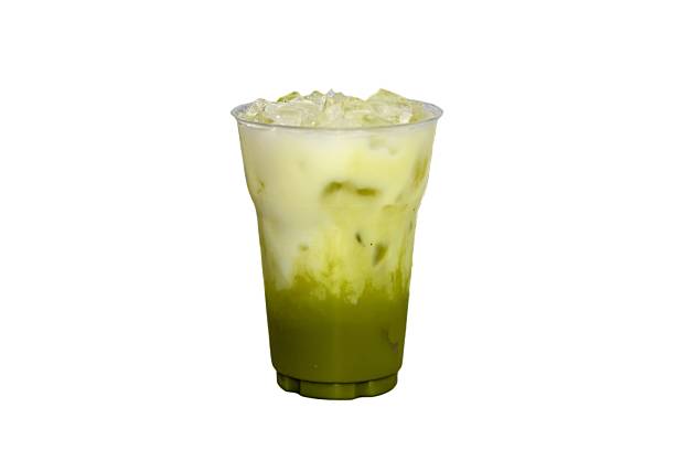 istock Ice matcha green tea mix coffee serving with coconut slices topping, isolate and white background. 2228161537