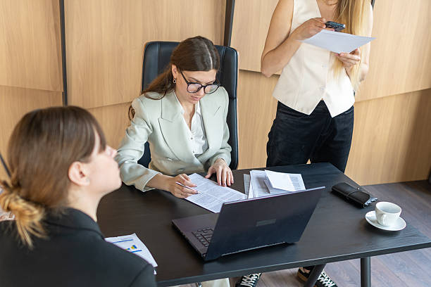 istock Businesswomen reviewing data information in modern office 2228162391