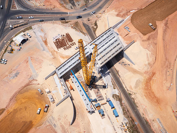 istock Aerial View of a Bridge Construction Site and Adjacent Roadway Infrastructure 2228167999
