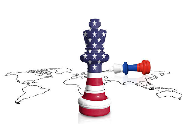 istock Chess made from flags of US and Russia on a world map 2228168983