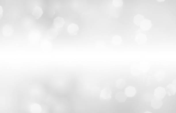 istock Silver grey white colored defocused bokeh lights glittering party shiny Christmas New Year party festival celebration horizontal illuminated blurred glowing vector background, poster, banner, backdrop with copy space 2228172324