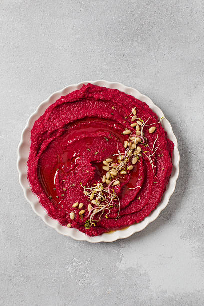 Top view beet hummus. Healthy and vegetarian snack concept. Concept of vegetarian