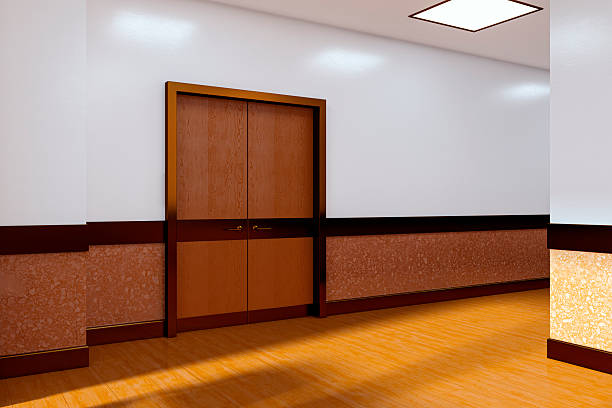 istock Modern clinic hallway corner with wooden double doors and clean interior design in empty indoor space with bright lighting and textured walls. 3D Rendering 2228183966