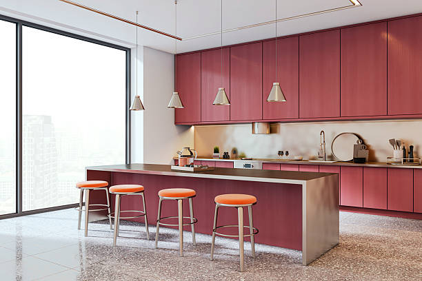 istock Contemporary kitchen interior with red cabinets, central island, and city view through large window in modern high-rise apartment space. 3D Rendering 2228184023
