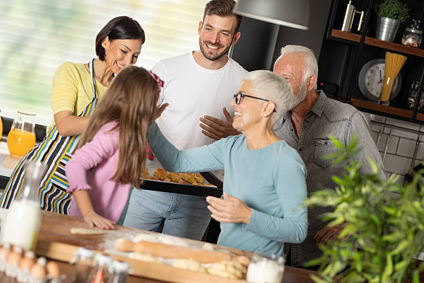 istock Joyful family is baking together in a modern kitchen 2228193535
