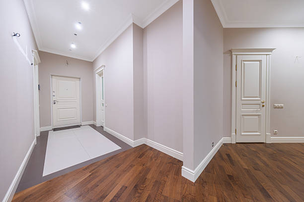 istock Modern hallway with hardwood flooring and elegant doors in a stylish interior setting 2228195236