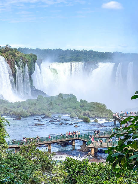 istock TOURISTS ON THE IGUAZU FALLS VIEWING PLATFORM  BRAZIL SIDE 2228196316