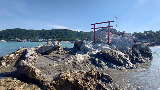 istock famous beaches in Japan,Sandy beach with waves crashing 2228197264