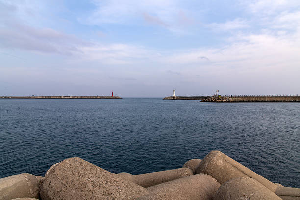 istock tetrapods and seawall at the harbor 2228197663