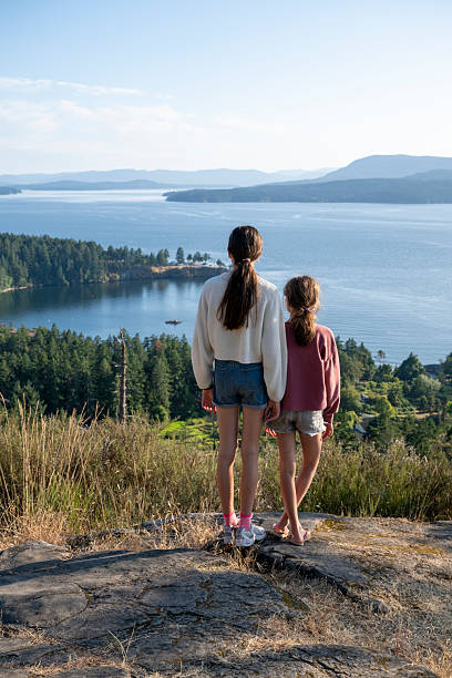 istock Sisters on mountain top above ocean, Gulf Islands 2228198611