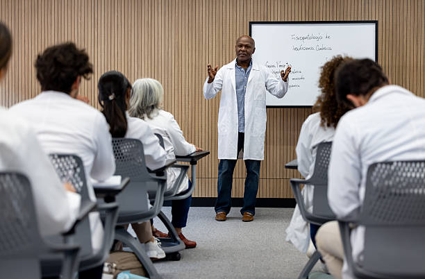 istock Doctor teaching a class to a group of medical students 2228200418