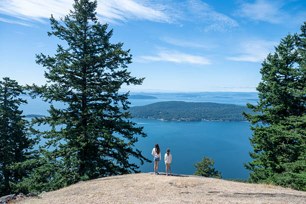 istock Sisters on mountain top above ocean, Gulf Islands 2228203908