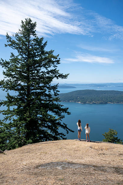istock Sisters on mountain top above ocean, Gulf Islands 2228204125