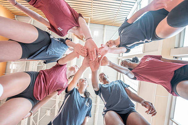 istock Team Huddle of Volleyball Players Displaying Unity and Motivation 2228205833