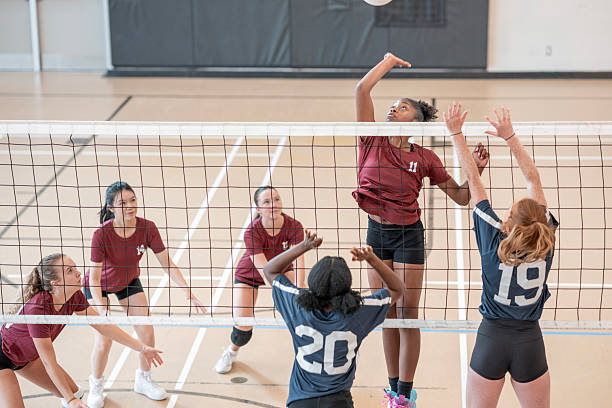 istock Exciting Indoor Volleyball Match Action During Competitive Play 2228206030