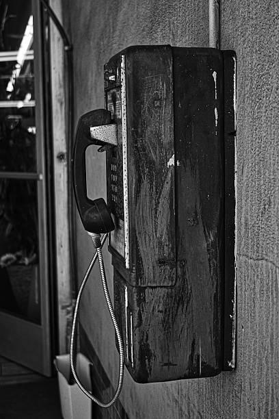 istock Old fashioned public pay phone 2228206898
