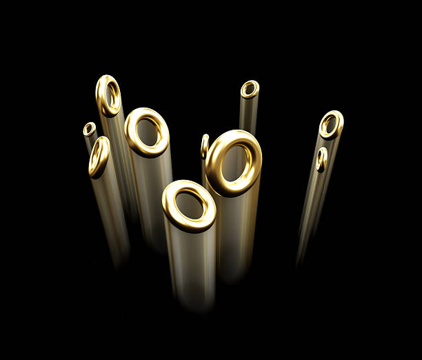 Multiple golden rings of different sizes are floating on a black background