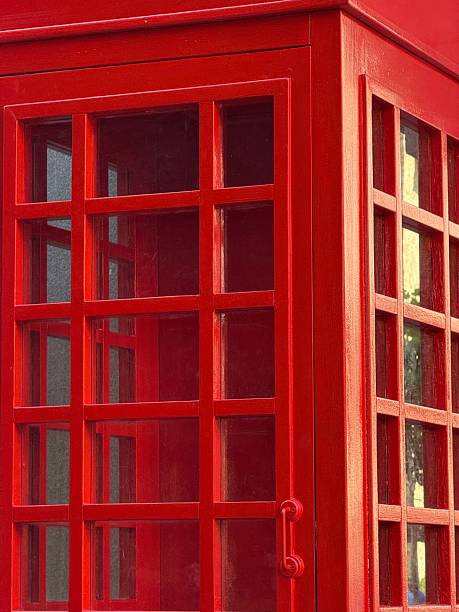 Red Wooden Booth with Glass Windows and Grid Design
