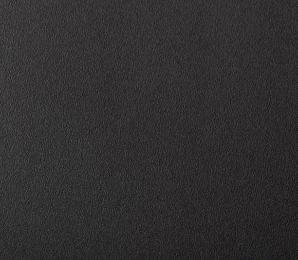 istock Black leather texture with a matte finish, creating a minimalistic, stylish backdrop. Elegant, 2228213919