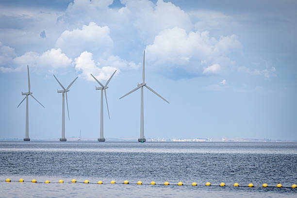 istock Wind turbines on Baltic Sea with cloudy blue sky background. 2228218336