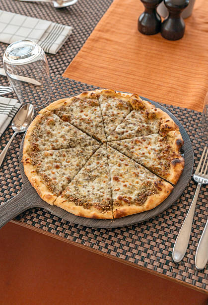 istock Arabic Zataar herb cheese pizza served for lunch in sunny lunch restaurant 2228219488