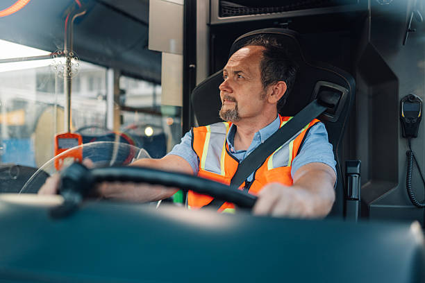 istock Bus driver concentrating while driving modern city bus 2228233893