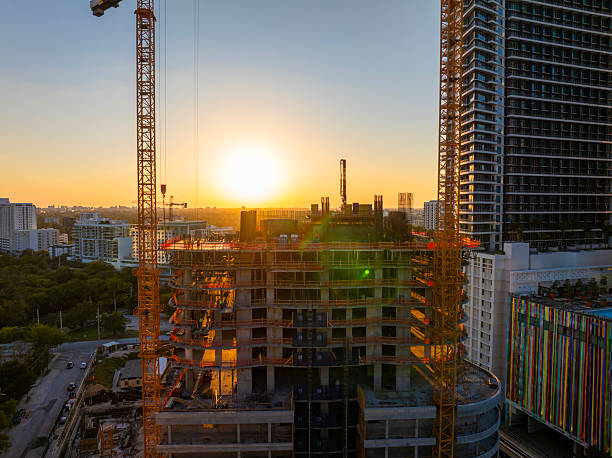 istock Miami, Florida. Developing American megapolis with new high-rise buildings under construction at sunset 2228234884